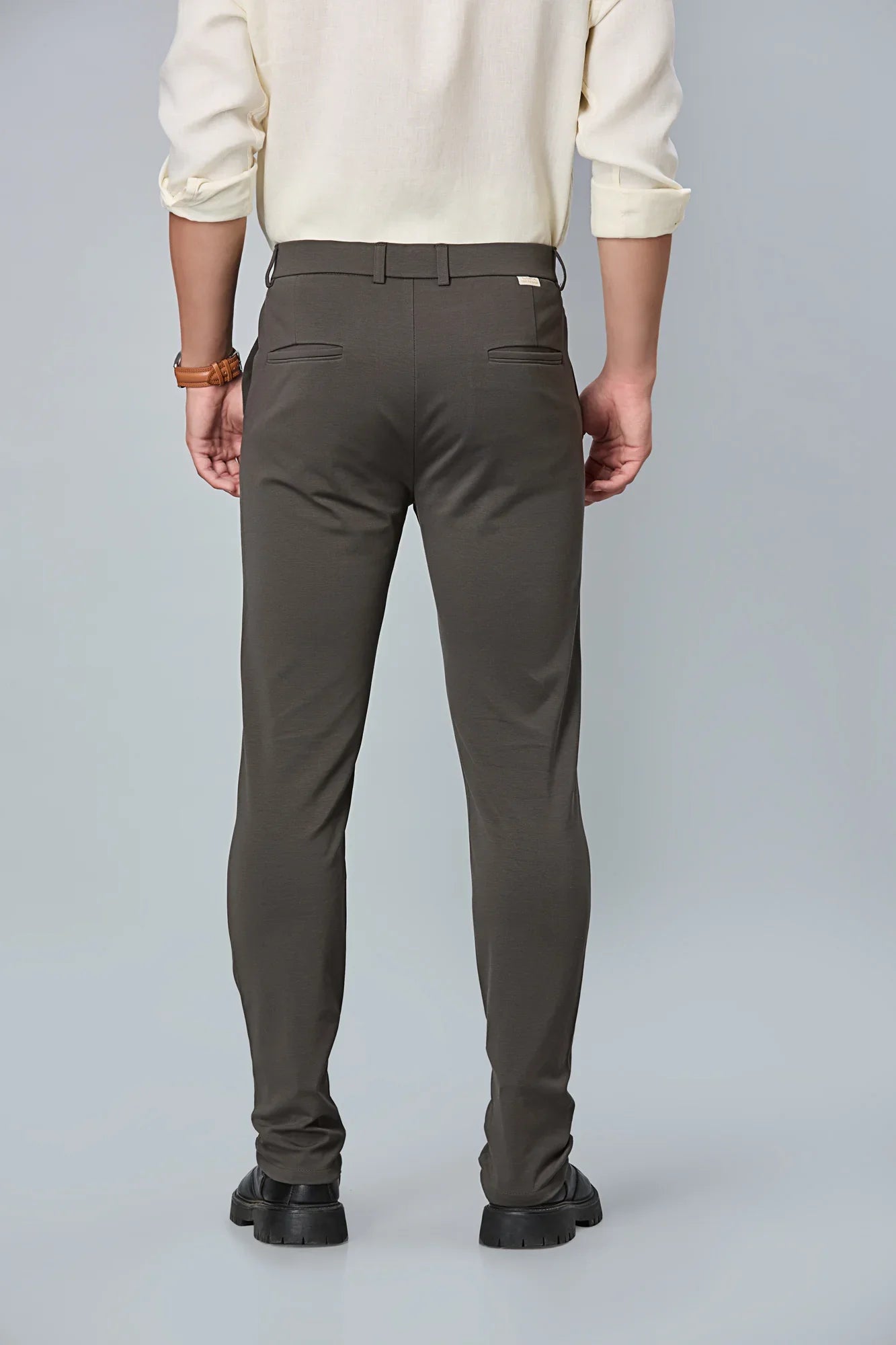 Back view of LOFA Grey slim fit formal trousers – clean seams, tailored structure, and premium cotton stretch fabric.