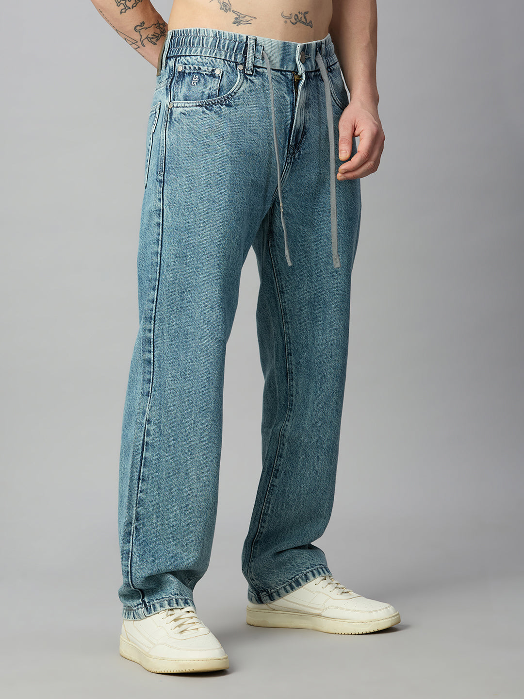 Premium light blue washed baggy jeans for men with elastic waist and drawstring – left side view