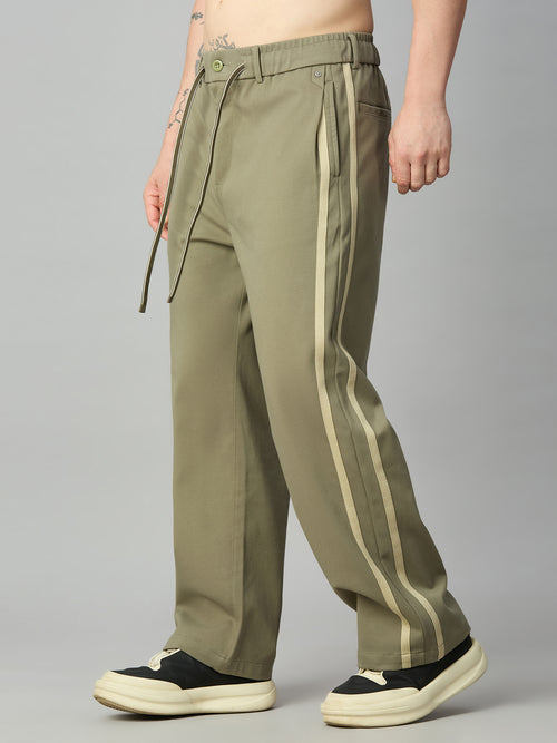 Men's relaxed fit cotton-Tencel smart pants with contrast side stripes – left side profile
