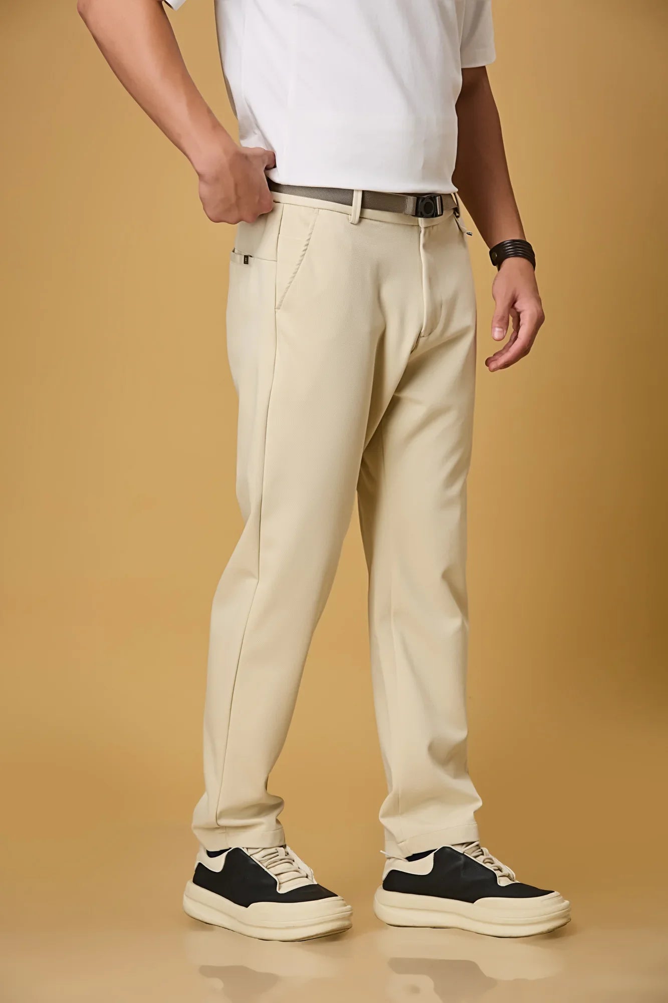 Side view of beige straight fit formal trousers for men – LOFA stretchable Tencel cotton spandex blend with belt detail.