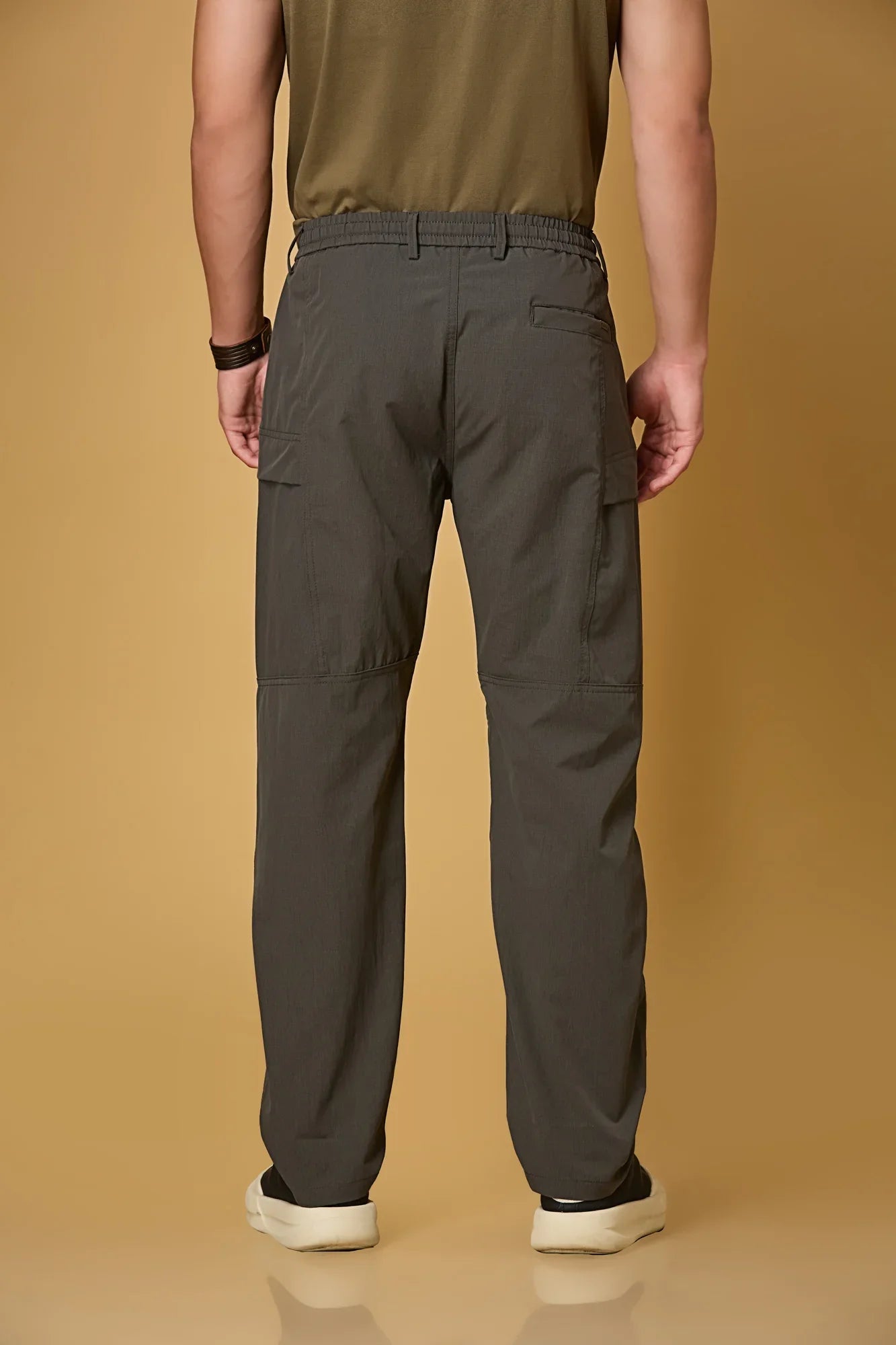 Men’s  grey casual pants back view – polyester stretch fabric comfort fit.