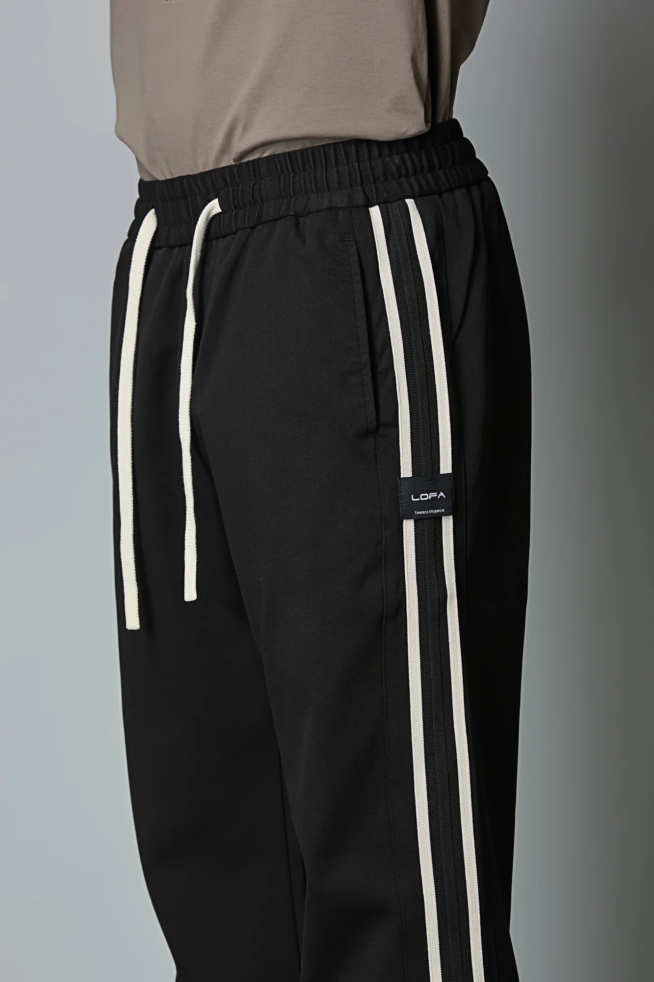 Triangle Ring & Waist String Detail on LOFA Men’s Black Baggy Fit Active Pants