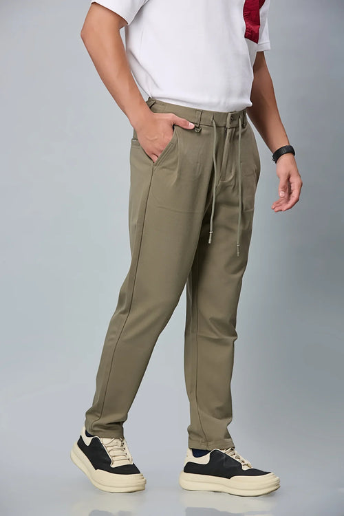 Side View of Mehendi Green Relaxed Fit Stretchable Trousers with Waist String – LOFA