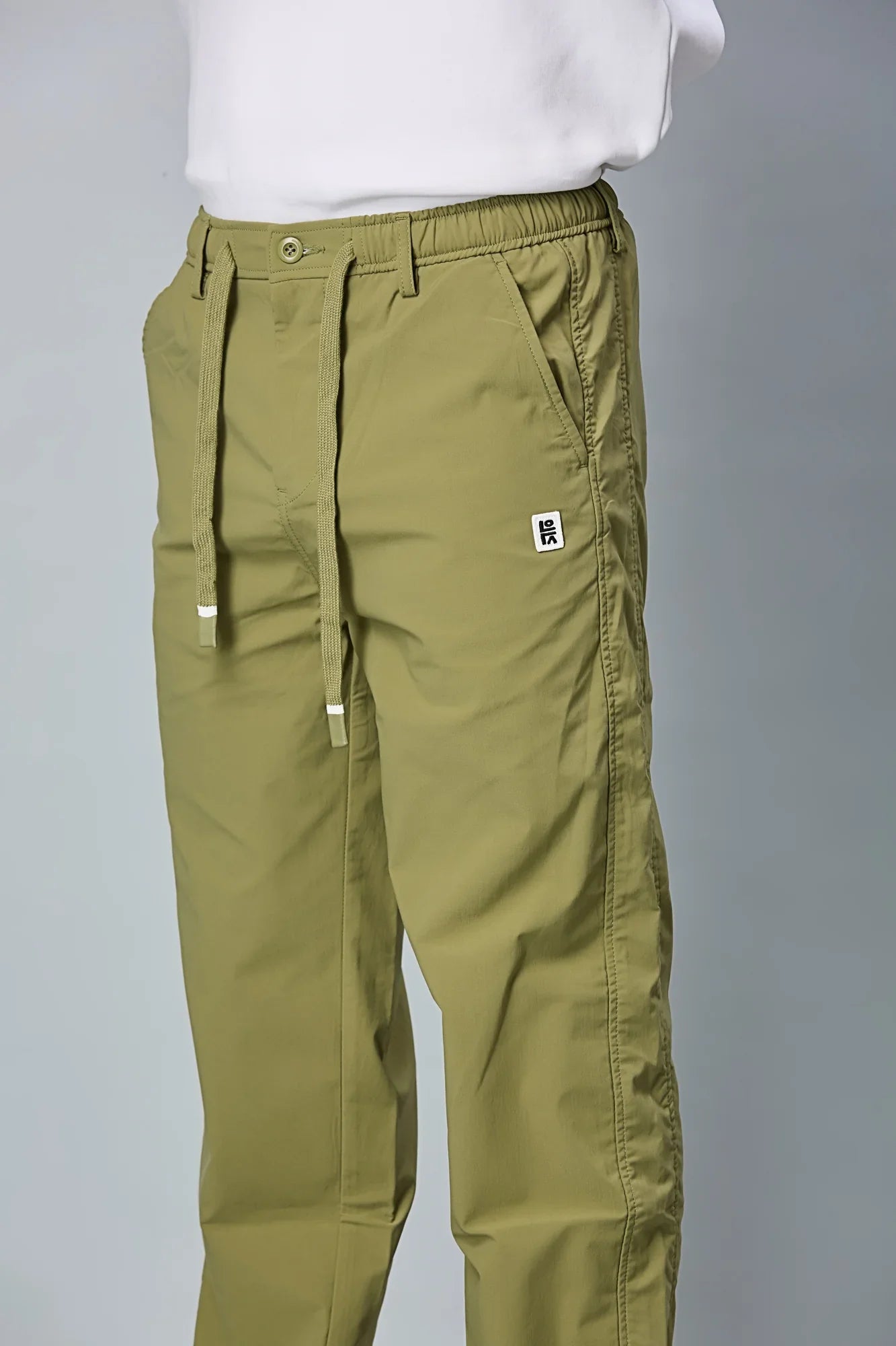 mesh attached and Waist String Detail on LOFA Men’s Mehndi Green Comfort Fit Trousers