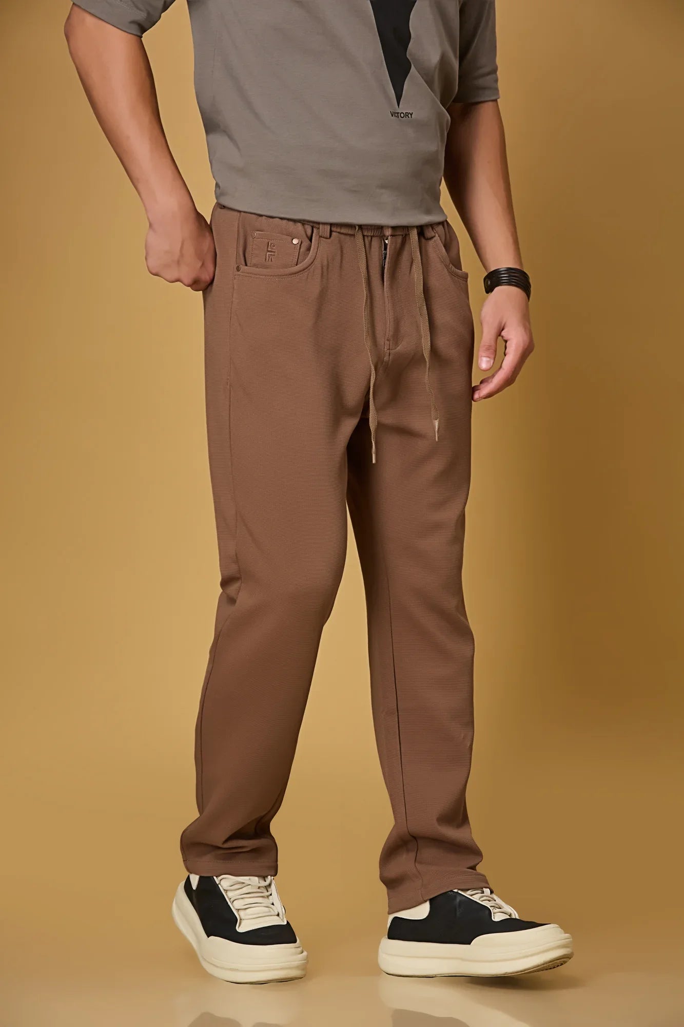 Side View of Coffee Brown Relaxed Fit Trousers with Waist String – LOFA