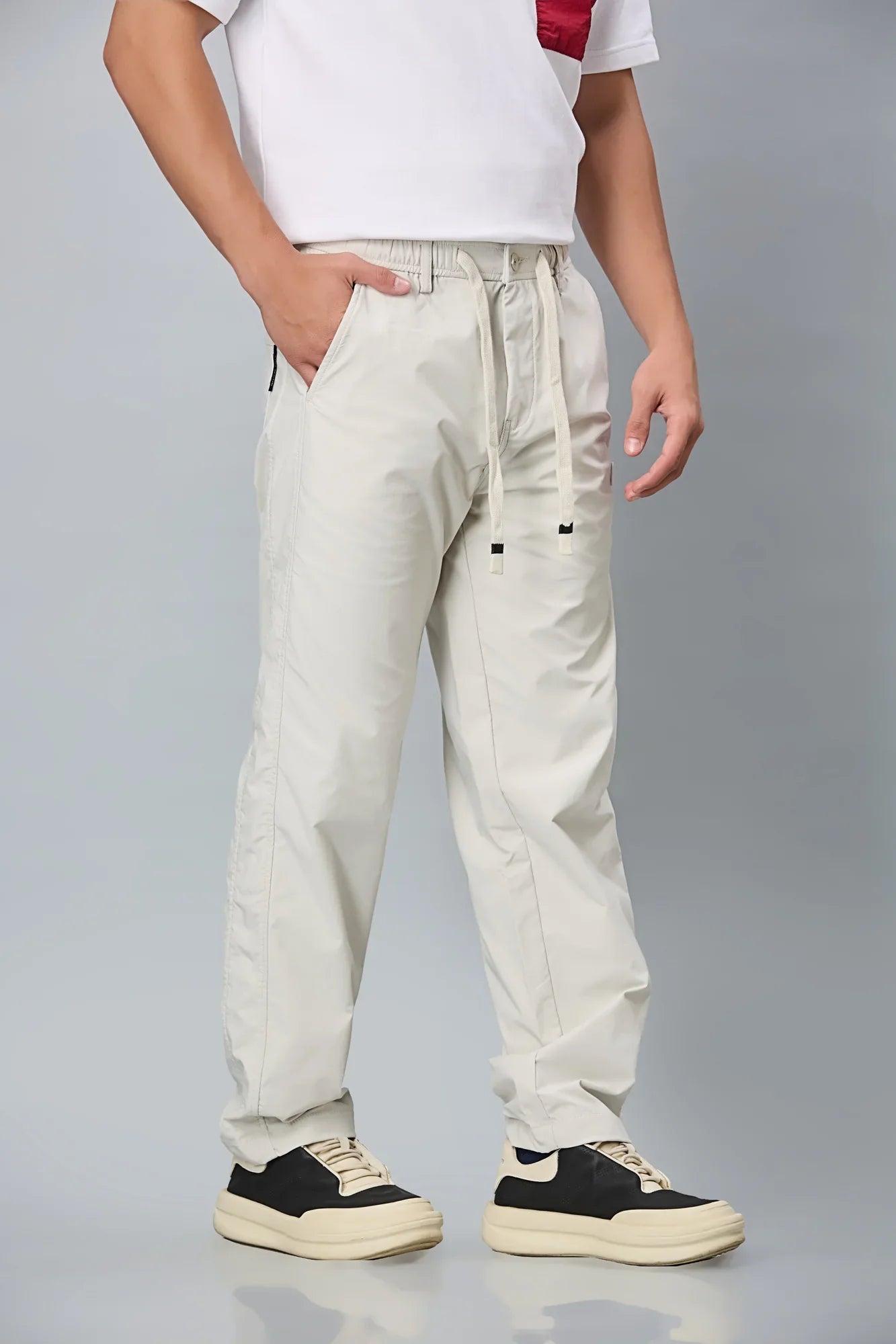 Side View of LOFA Cream Comfort Fit Trousers with Waist String