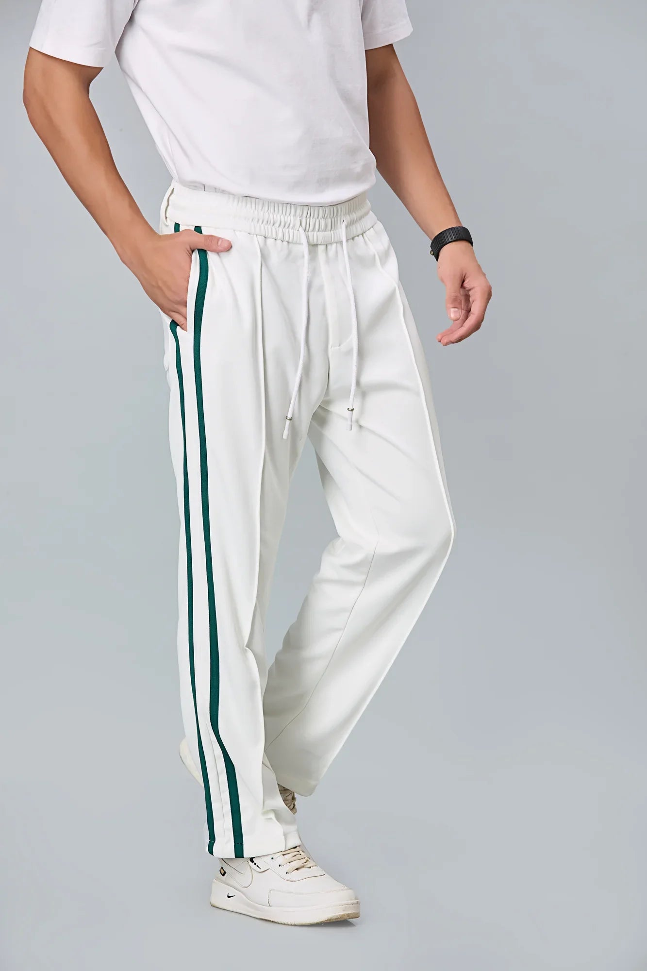 Side view of men’s white straight-fit active trousers – LOFA lightweight stretchable pants for casual and active wear.